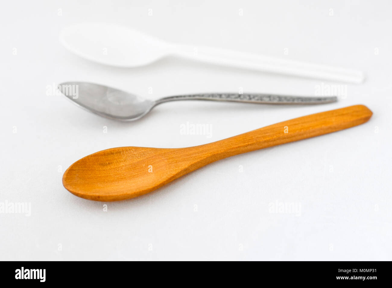 Why use a wooden spoon instead of a metal spoon Wooden Spoon Plastic Spoon And Metal Spoon Stock Photo Alamy