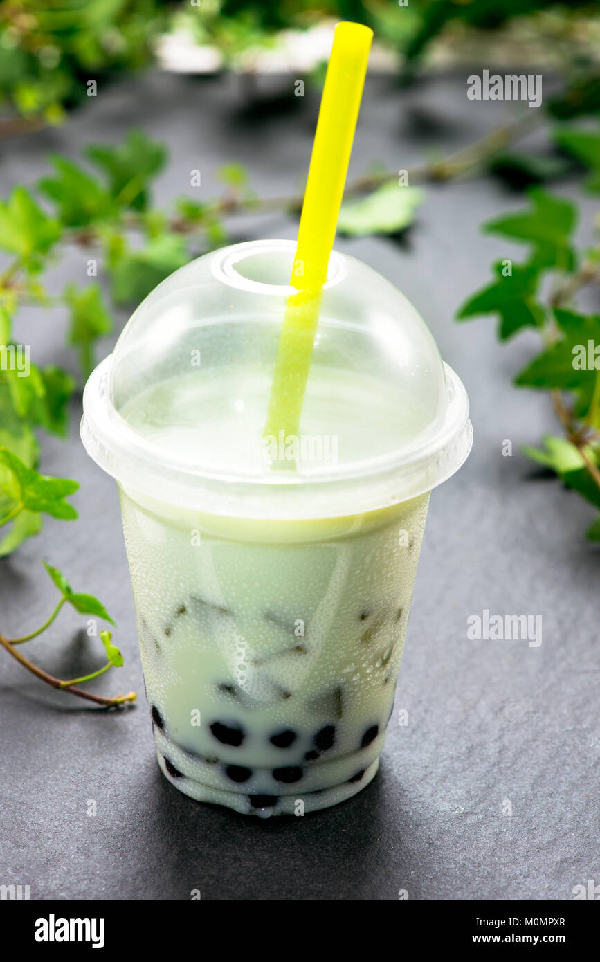 Green matcha bubble tea and black tapioca pearls Stock Photo Alamy