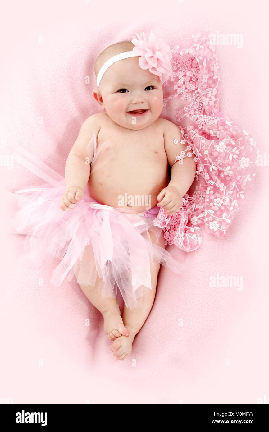 Happy beautiful baby girl, 4 months old Stock Photo - Alamy