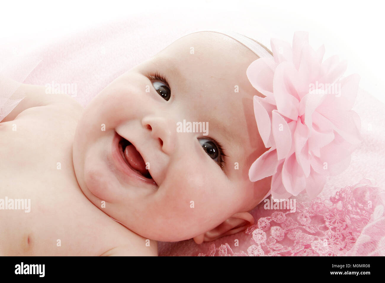 Happy beautiful baby girl, 4 months old Stock Photo - Alamy