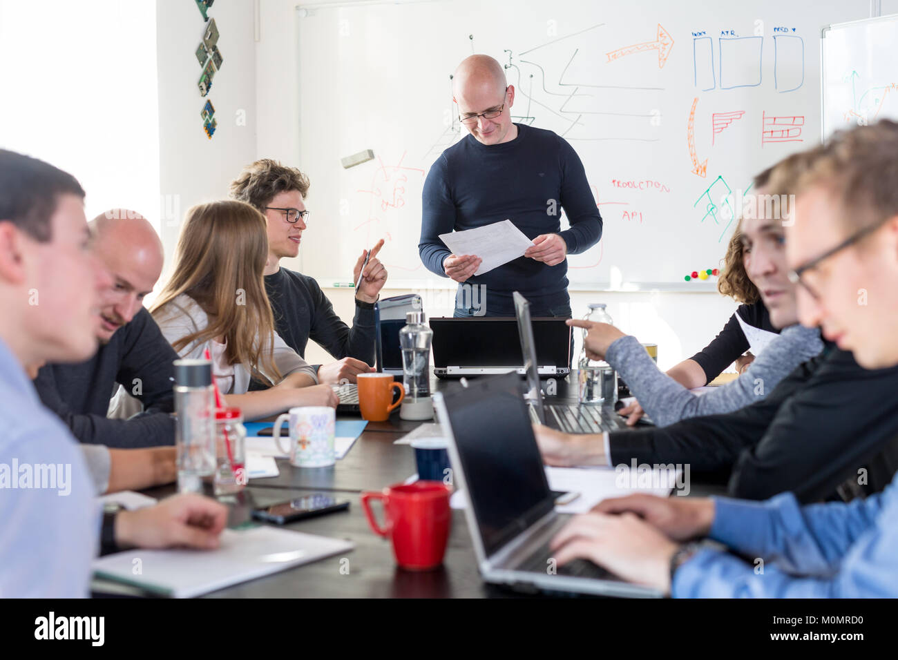 Relaxed informal IT business startup company meeting. Team leaders