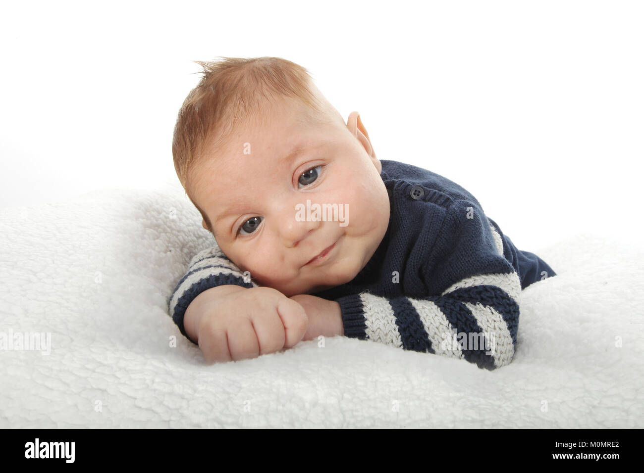 turning difficulty, disabled child, chubby little boy, large infant Stock Photo