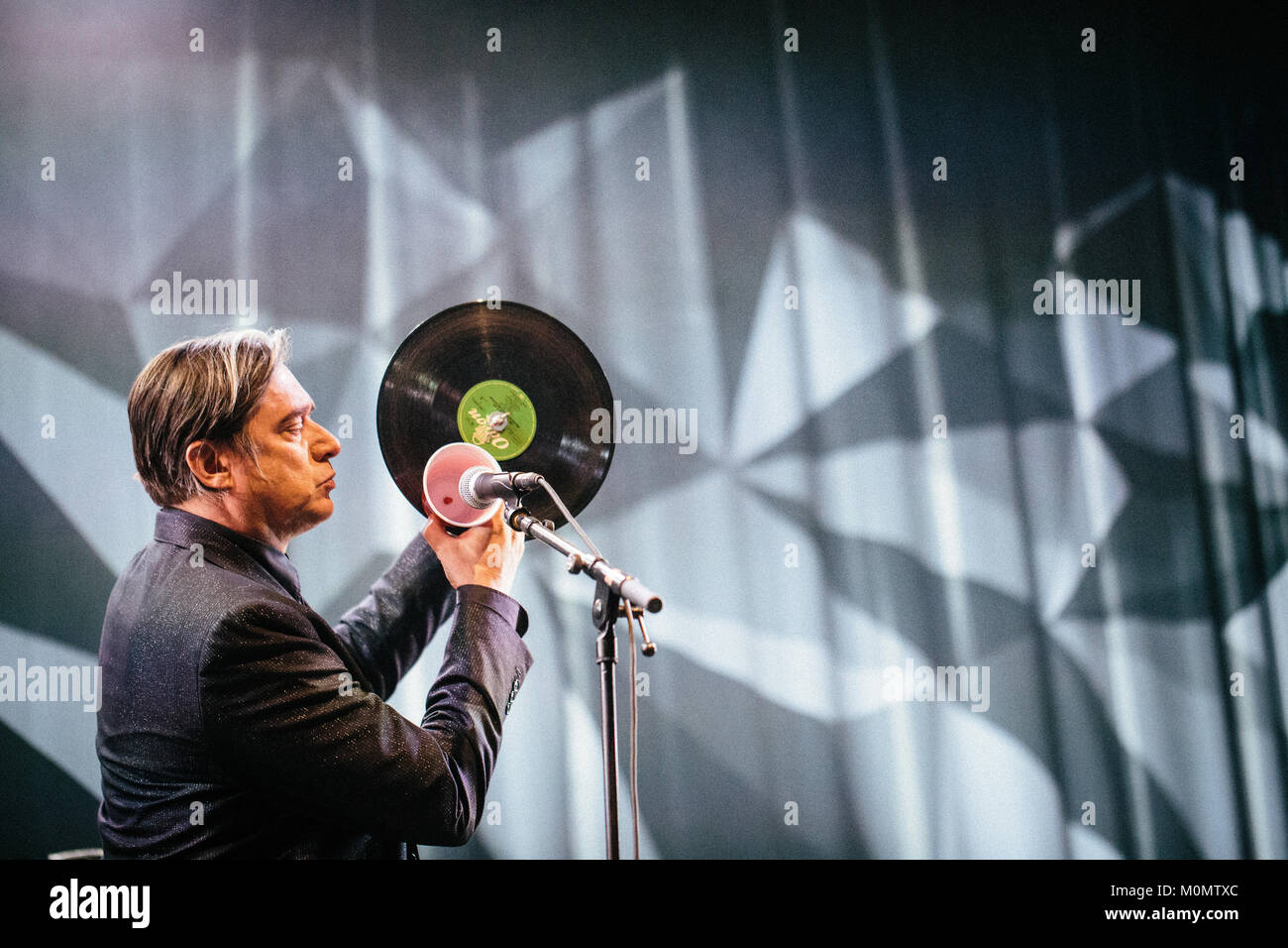The German industrial band Einstürzende Neubauten performs a live concert at the Danish music festival Roskilde Festival 2015. Here singer and artist Blixa Bargeld is pictured live on stage. Denmark, 03/07 2015. Stock Photo