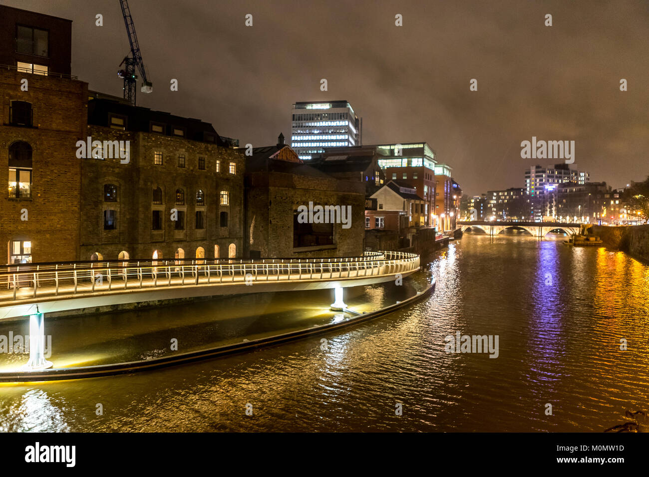 Finzel's Reach footbridge to a new urban redevelopment area illuminated ...