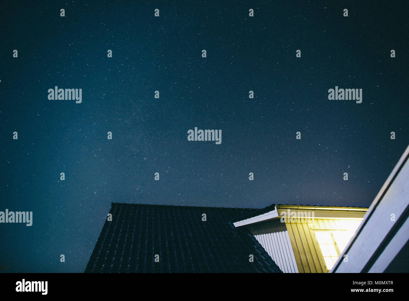 A house photographed at night when most people sleep under the stars ...