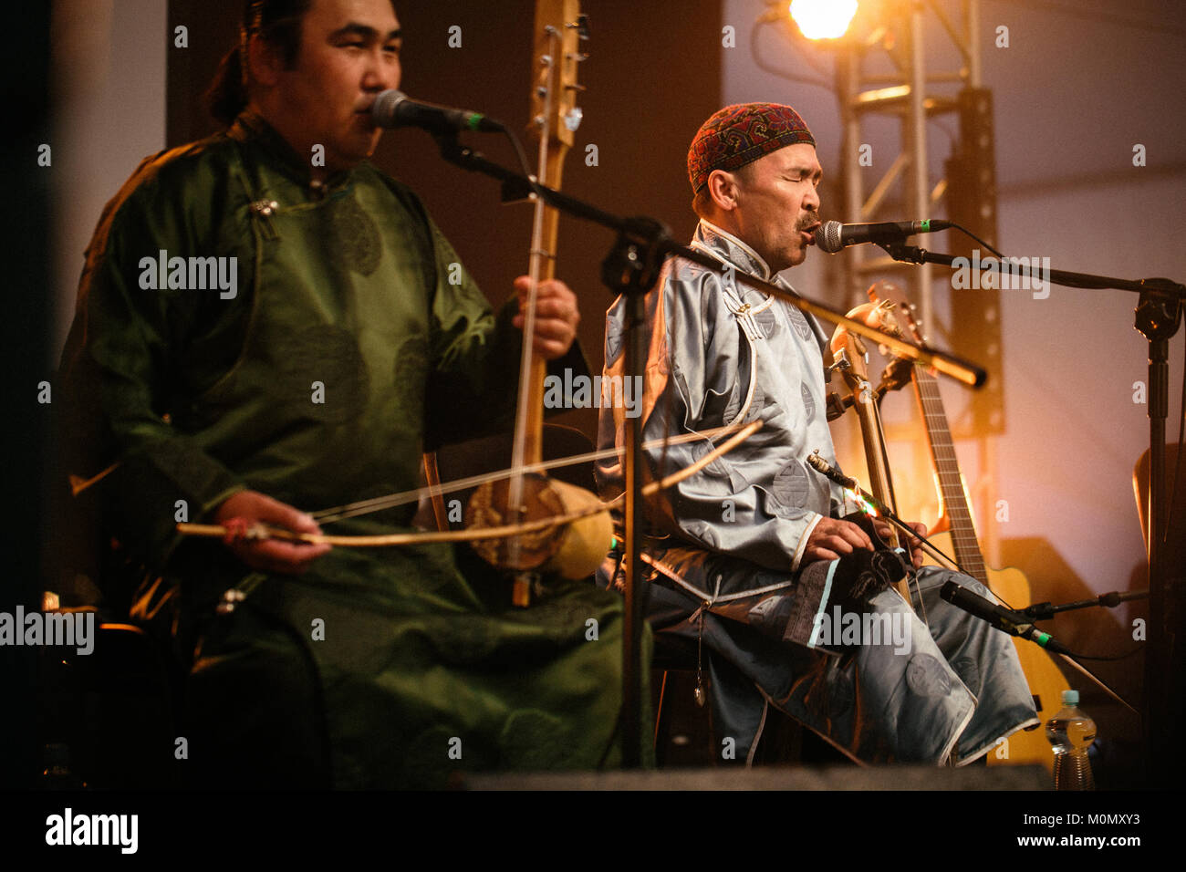 The Russian-Mongolian folk and throat singing band Huun-Huur-Tu performs a live concert at the Polish music festival Off Festival 2015 in Katowice. Here throat singer and musician Kaigal-ool Khovalyg on igil is pictured live on stage. Poland, 08/08 2015. Stock Photo