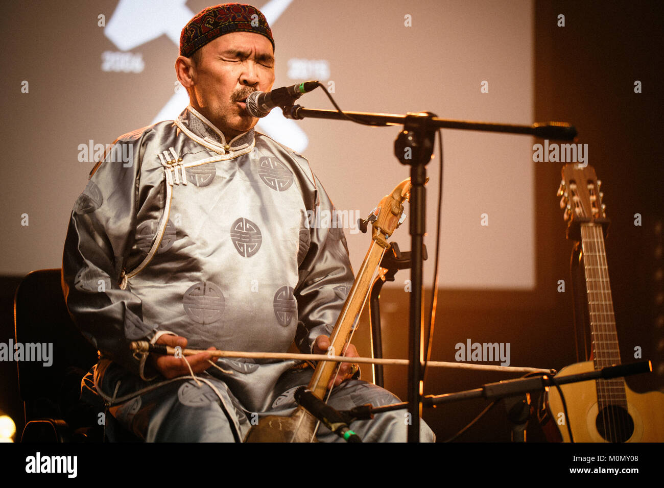 The Russian-Mongolian folk and throat singing band Huun-Huur-Tu performs a live concert at the Polish music festival Off Festival 2015 in Katowice. Here throat singer and musician Kaigal-ool Khovalyg on igil is pictured live on stage. Poland, 08/08 2015. Stock Photo