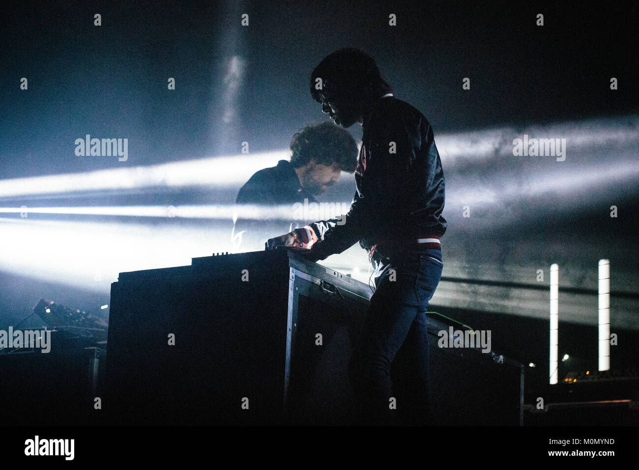 The French electronic music duo Justice (stylised as Jus†ice) performs