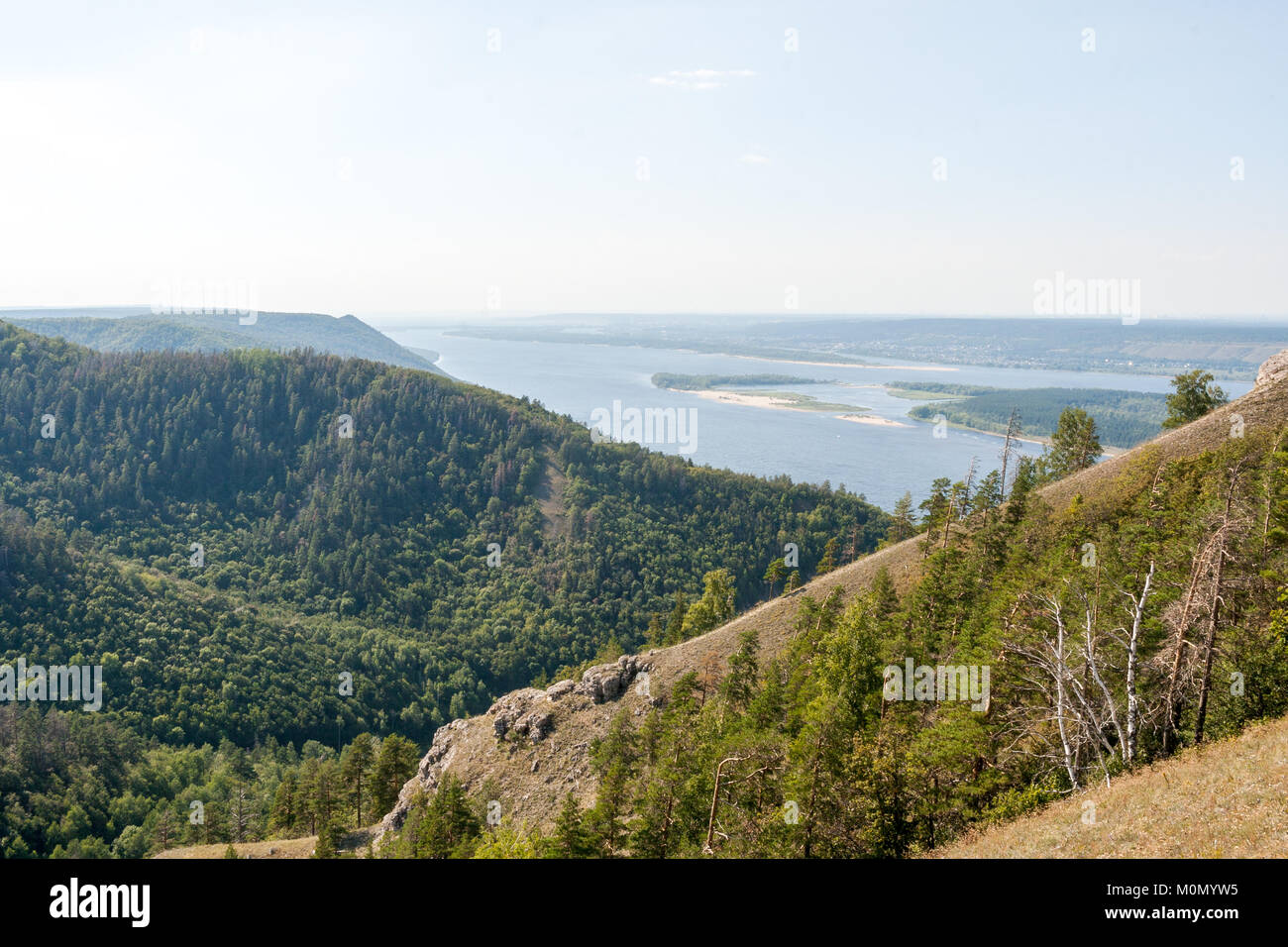 View of Volga riverbed and wooded the Zhiguli mountains from top of Strelnaya mount. Stock Photo