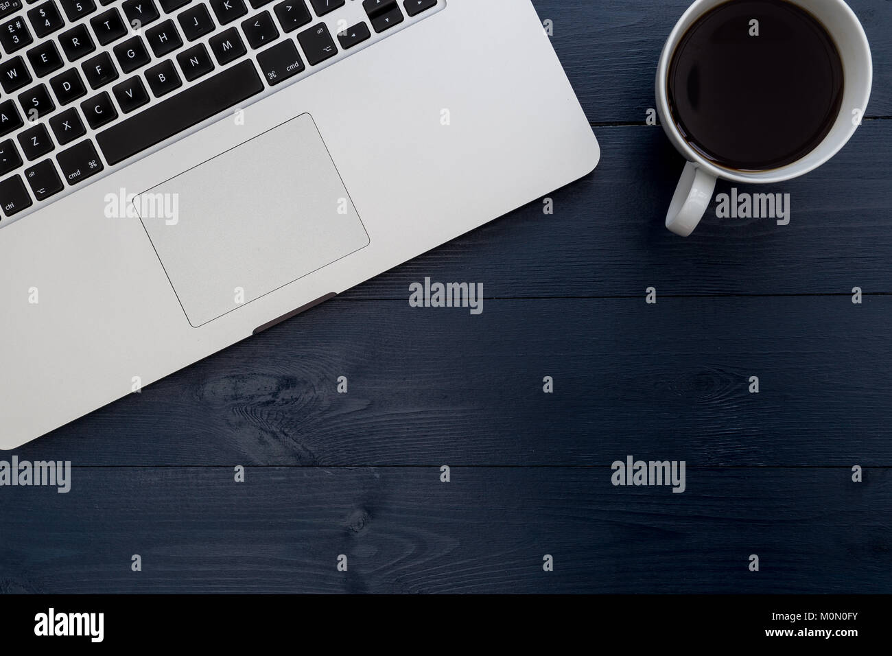 Laptop Computer And Coffee Cup On Dark Office Table Background Stock Photo Alamy Laptop Computer And Coffee Cup On Dark Office Table Background Stock Photo Alamy