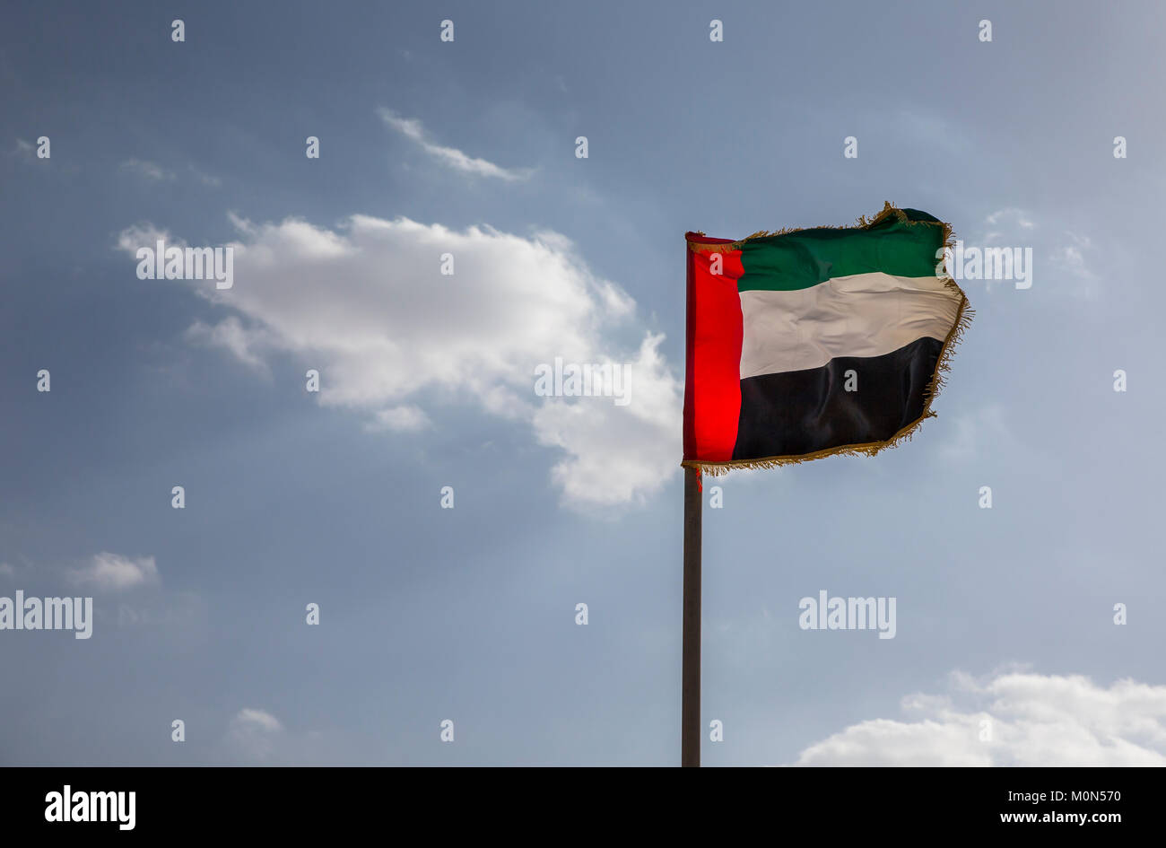 UAE flag flying in the wind Stock Photo