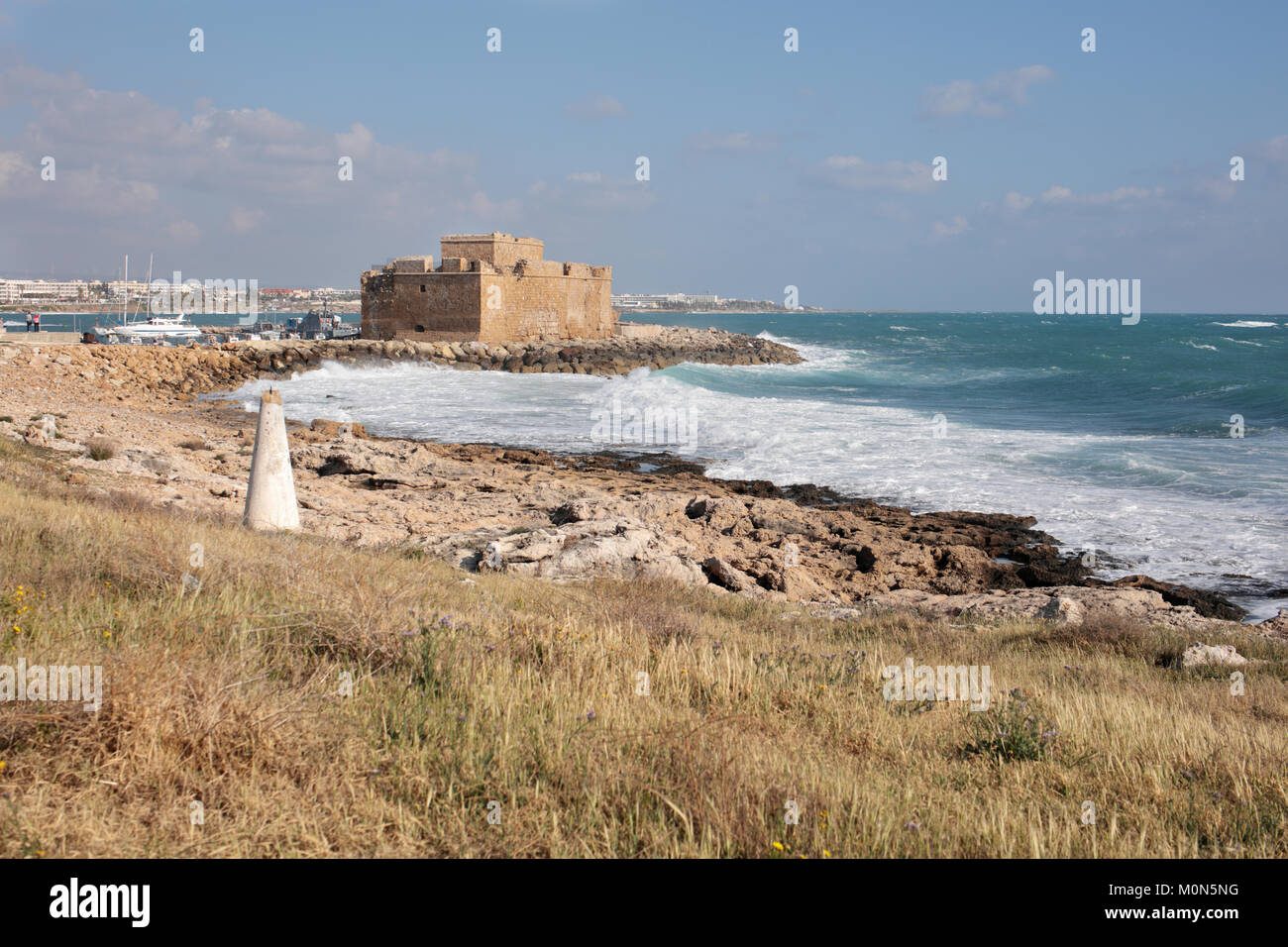 Paphos, Cyprus - March 16, 2016: View to the Paphos castle in a spring day. Medieval castle was declared a listed building in 1935 and represents one  Stock Photo
