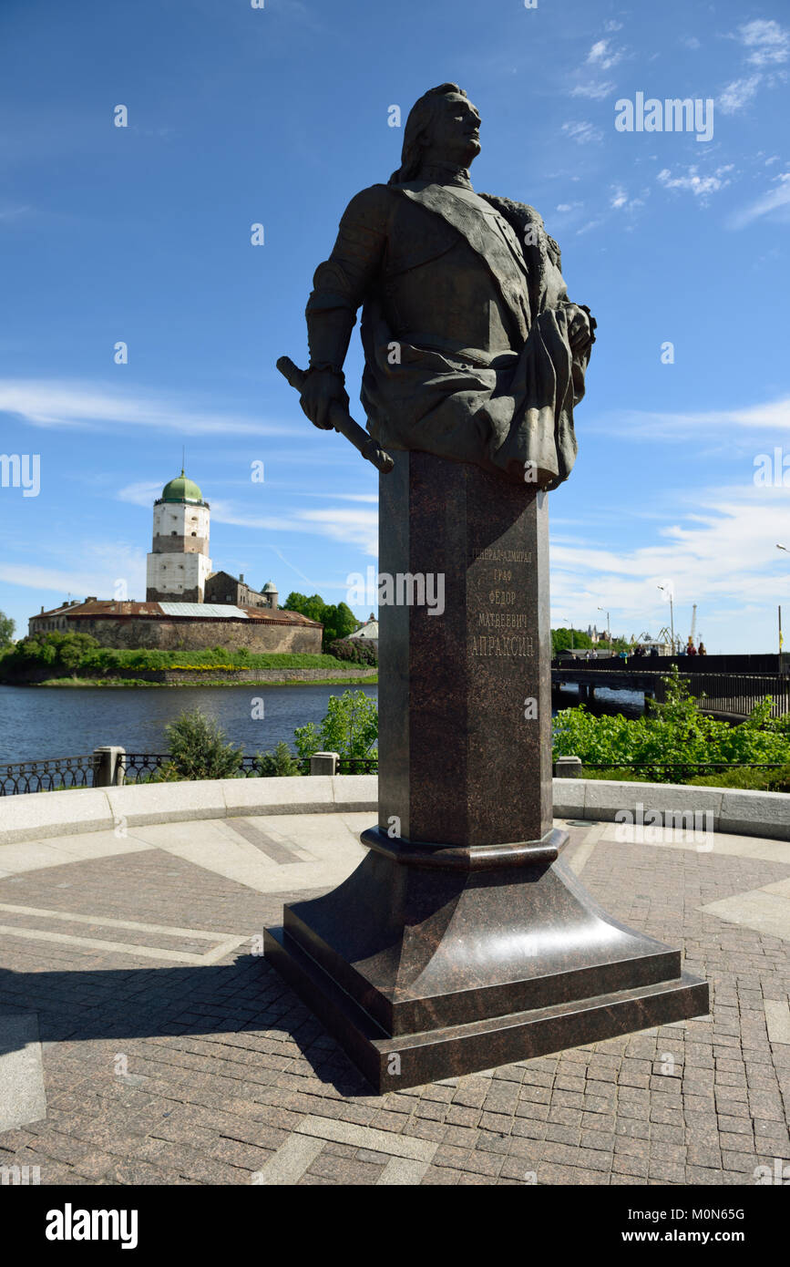 Vyborg, Leningrad oblast, Russia - June 06, 2015: Monument to admiral count Fyodor Apraksin against the Vyborg castle. Monument was erected in 2010 Stock Photo