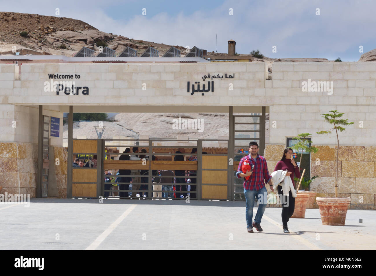 Petra, Jordan - March 15, 2014: Tourists near the main entrance to Petra. Since 1985, Petra is listed as UNESCO World Heritage site Stock Photo