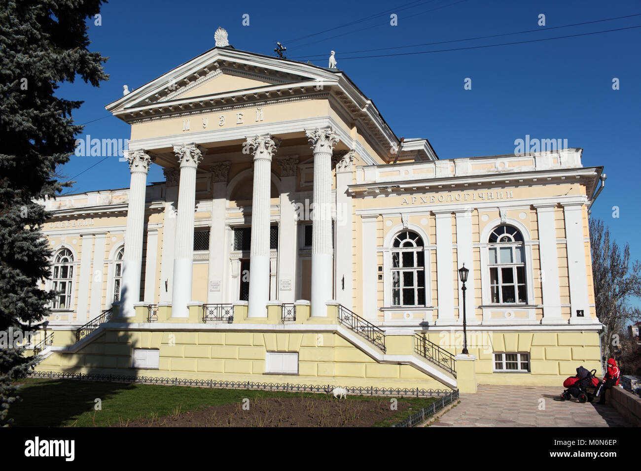 Odessa, Ukraine - March 23, 2015: People near the Archaeological museum. Founded in 1825, it is one of the oldest museums in Ukraine Stock Photo