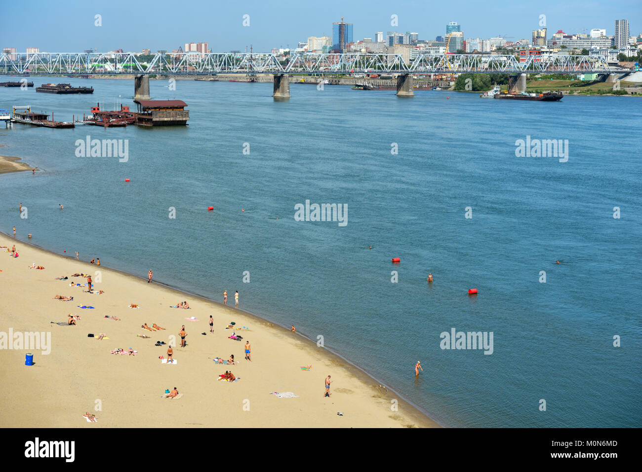 Novosibirsk, Russia - August 24, 2014: People resting on the beach Nautilus on the left bank of Ob river. Stock Photo