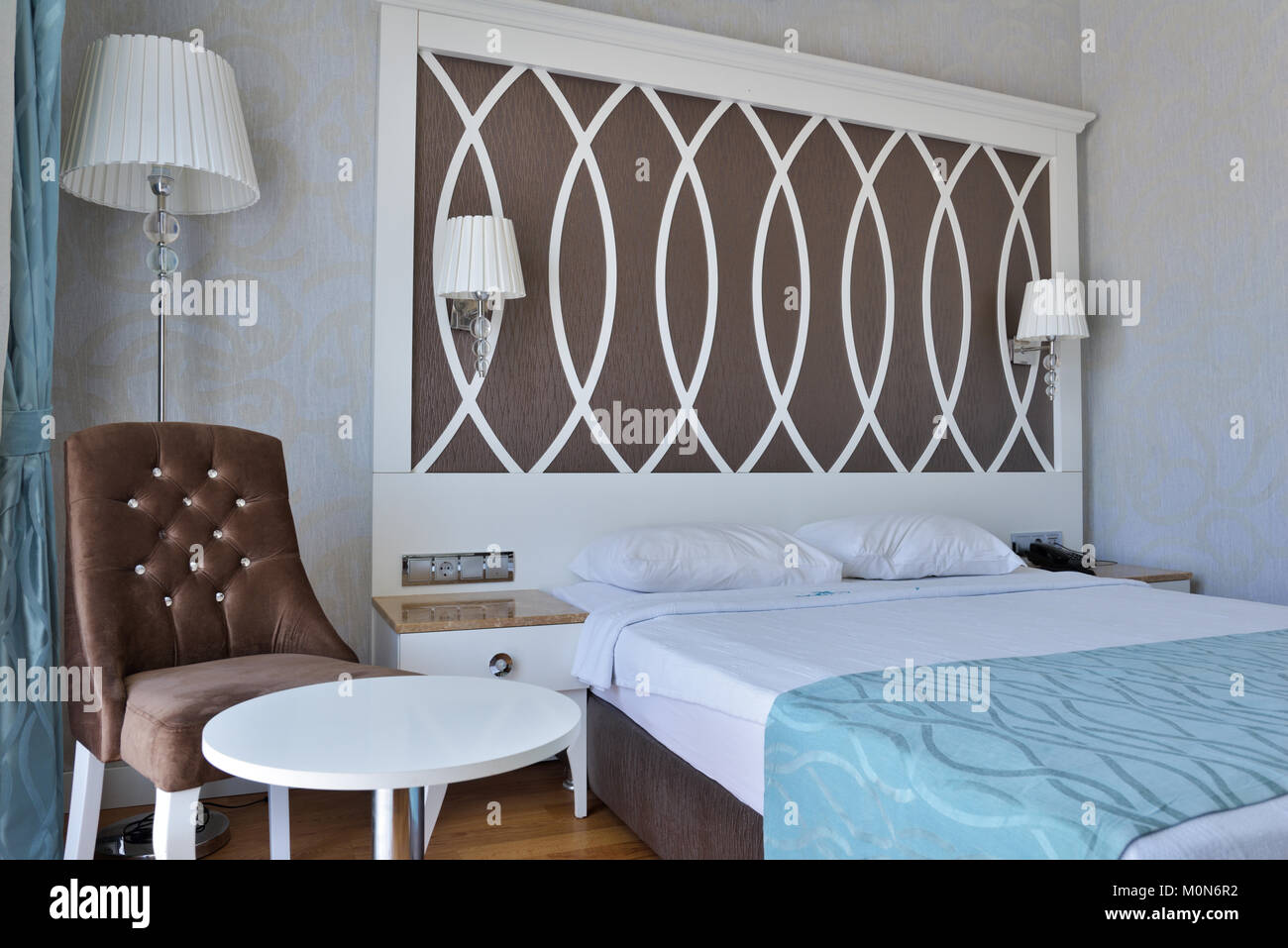 Oludeniz, Turkey - March 30, 2014: Interior of a bedroom with double bed in the Ocean Blue High Class Hotel. This 4 star hotel offer to the guests 68  Stock Photo