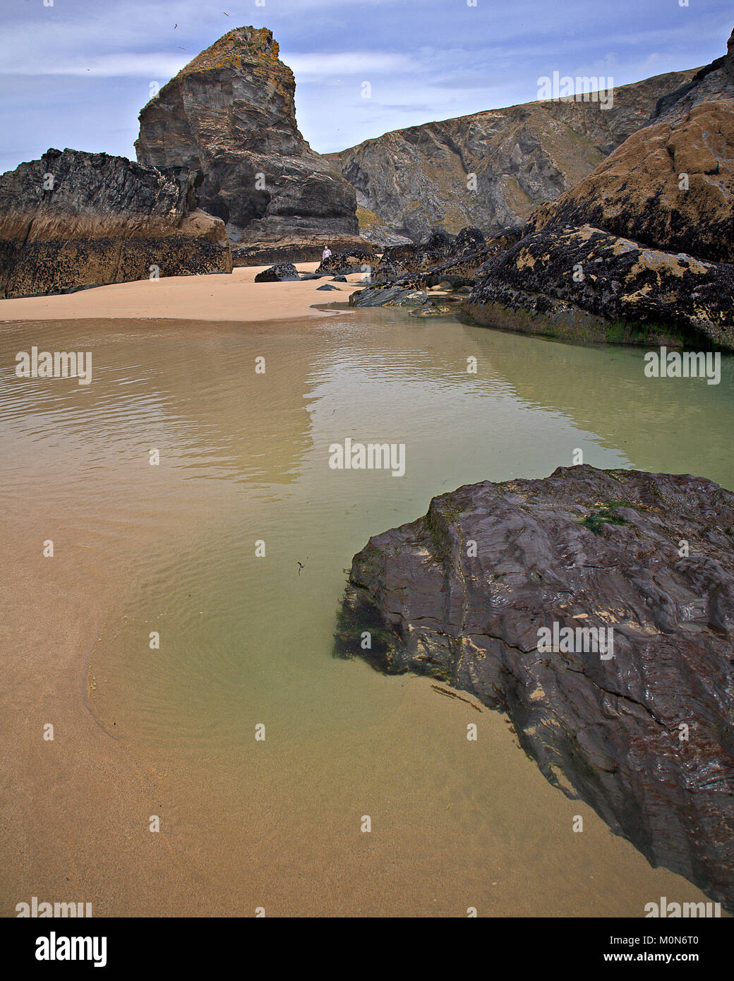 Rocks , tidal pool and beach at Bedruthan Steps, Cornwall Stock Photo