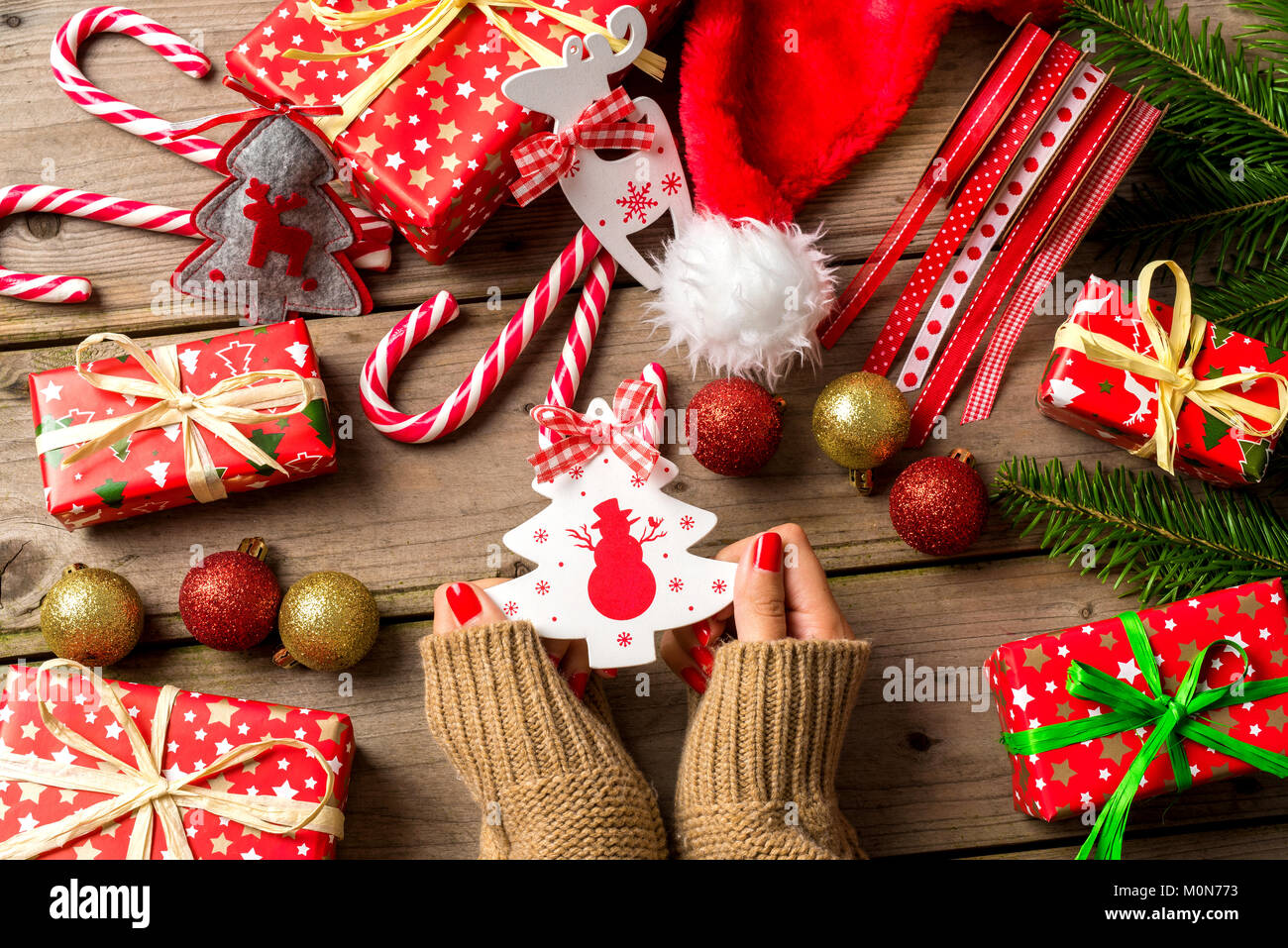 Woman packing christmas tree hi-res stock photography and images - Alamy
