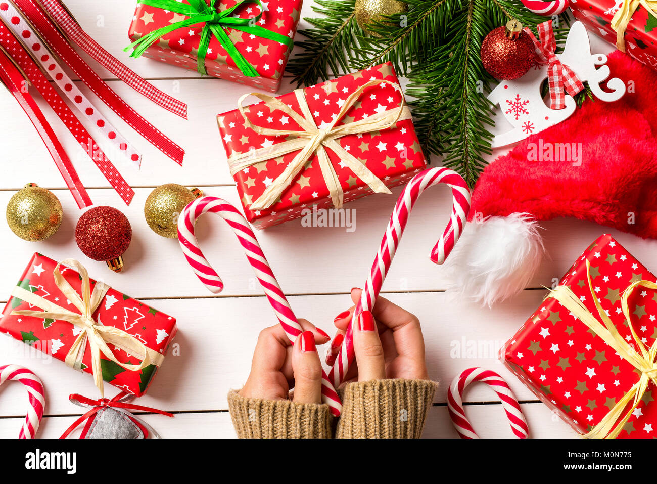 Woman packing christmas tree hi-res stock photography and images - Alamy