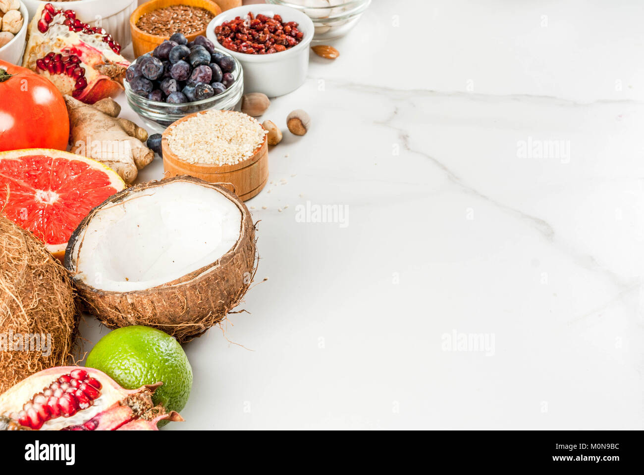 Set of organic healthy diet food, superfoods beans, legumes, nuts, seeds, greens, fruit and