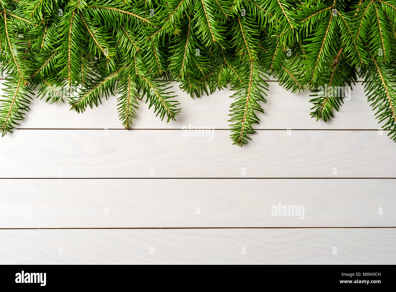 Christmas tree over wooden background Stock Photo - Alamy
