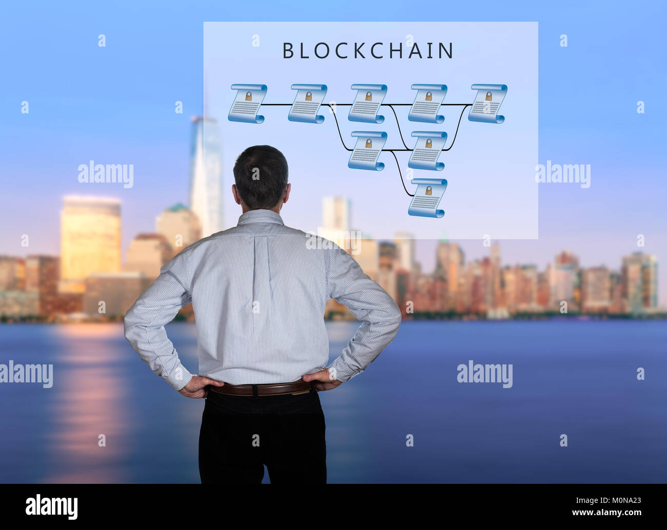 Senior technologist looking at blockchain illustration Stock Photo