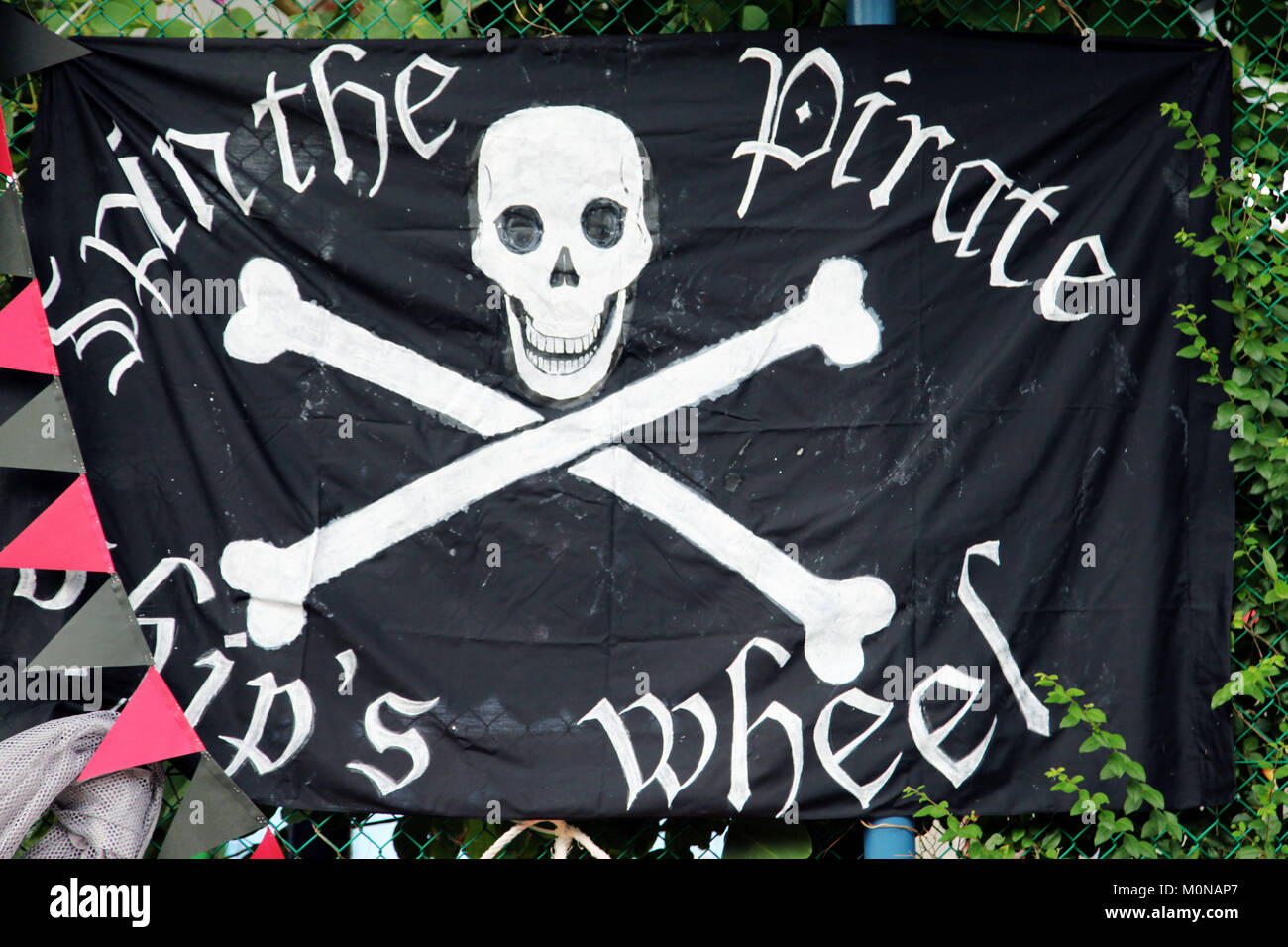 It's a pirat flag with a dead skull icon with the bones Stock Photo
