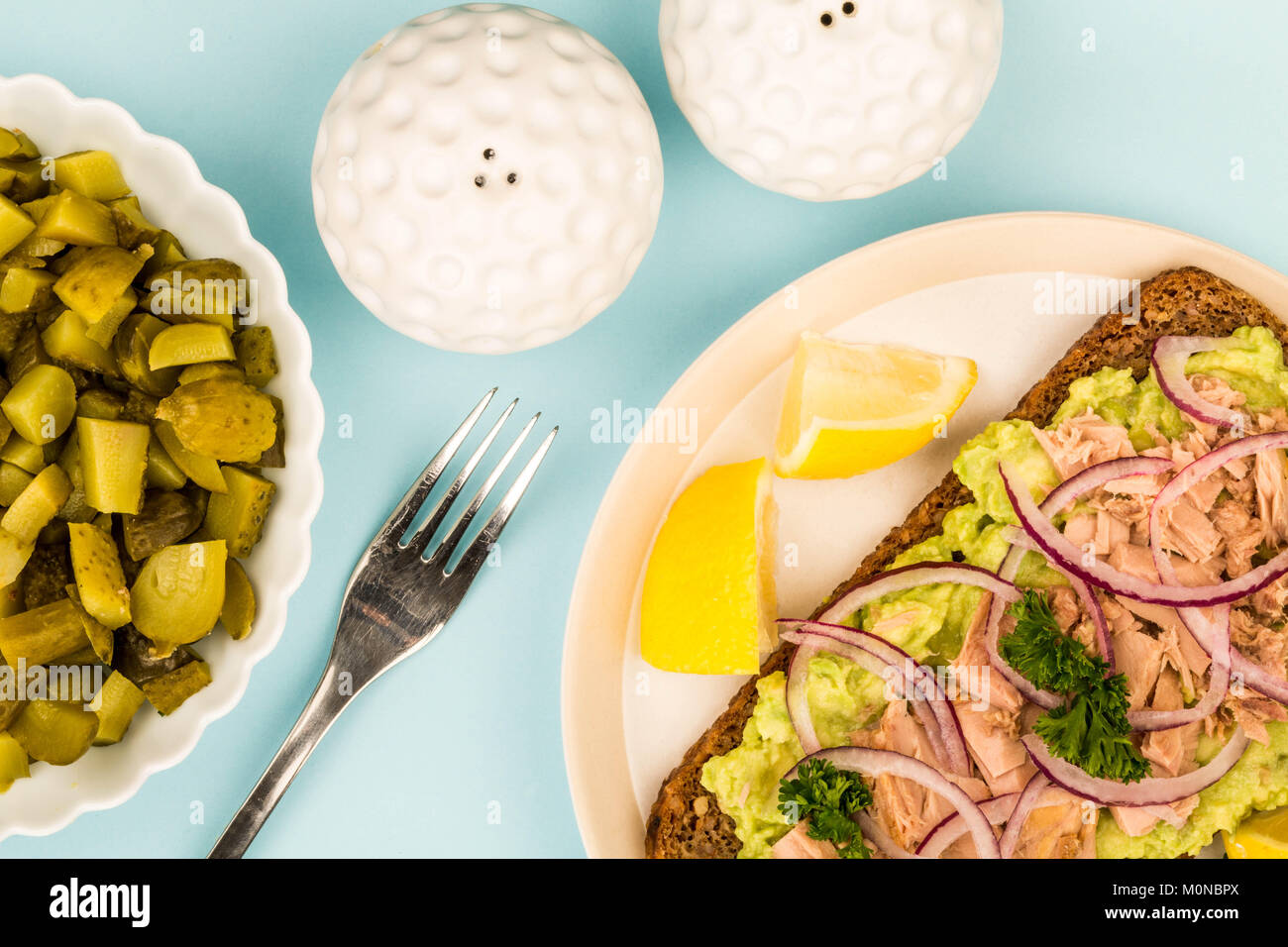 Tuna Fish and Avocado With Onions on Rye Bread Open Face Sandwich