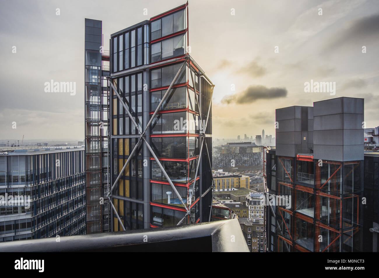 London cityscape against the sun while sunset. Stock Photo