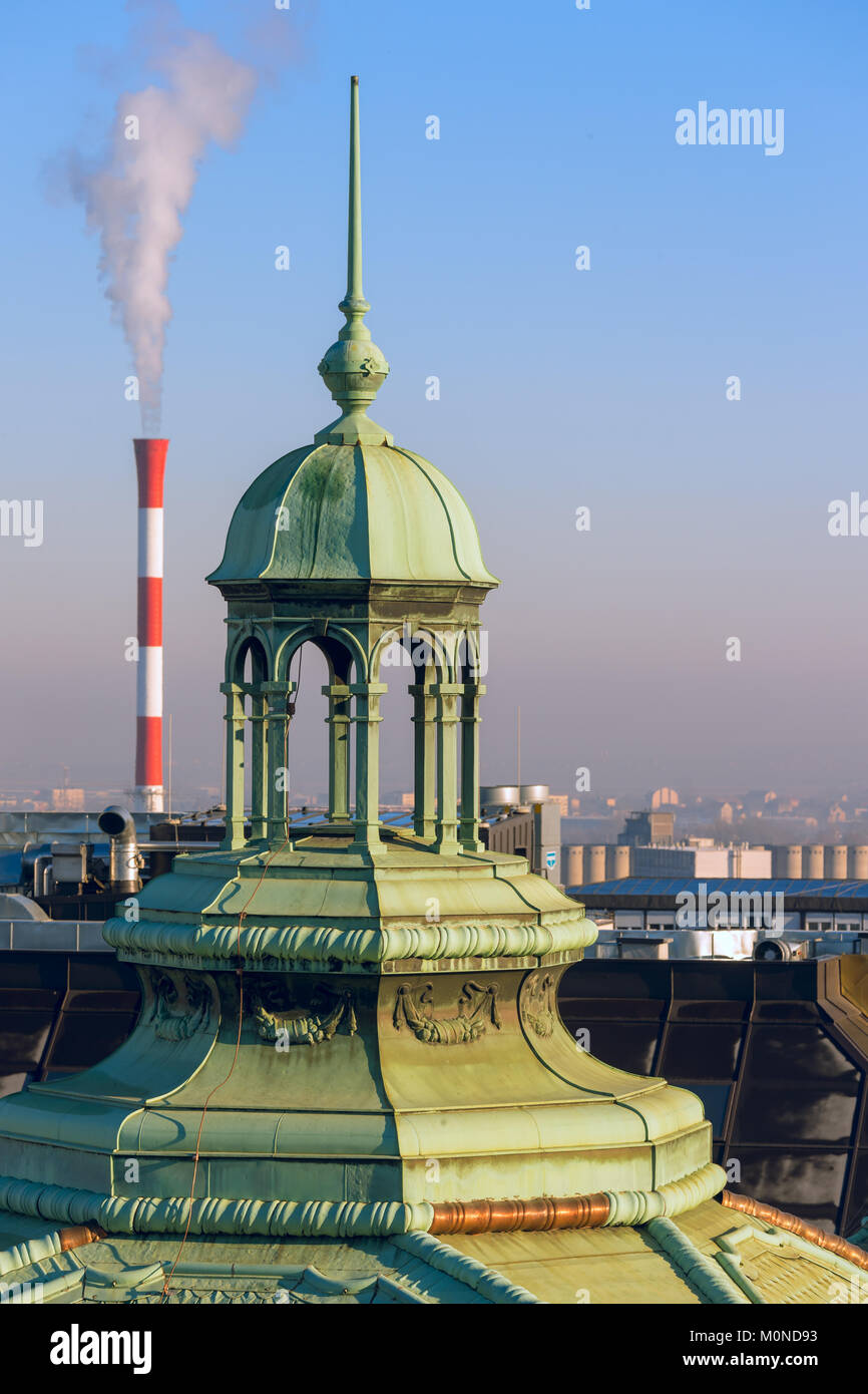 Detail of an historical architecture's roof and chimney of an industrial plant Stock Photo