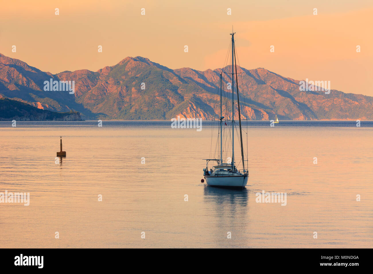 Beautiful Seascape With Sailing Boat During Sunrise In Turunc Province In Marmaris Turkey Stock Photo Alamy