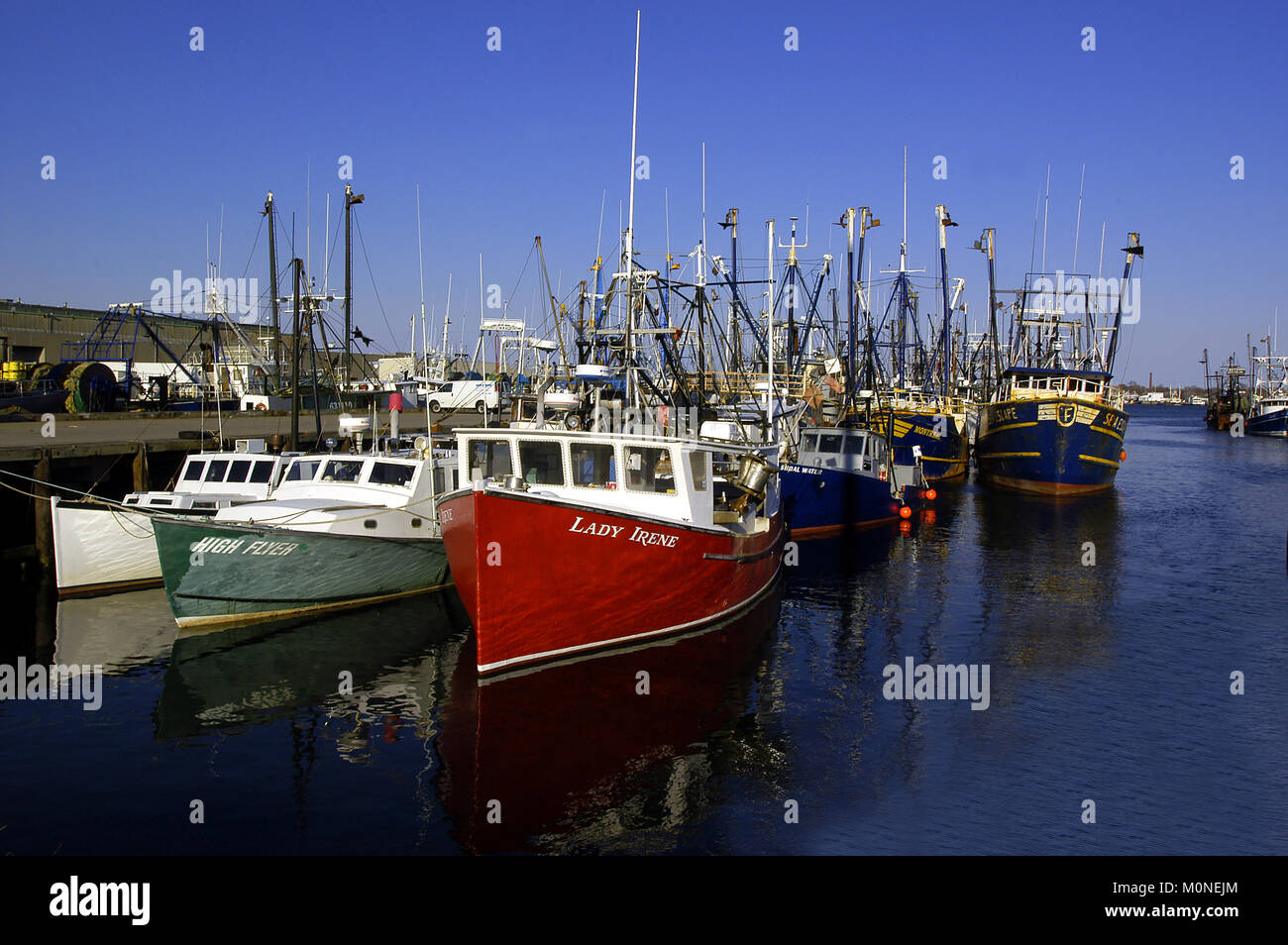 Fishing Trawlers along the fish pier in New Bedford, Massachsetts, USA Stock Photo