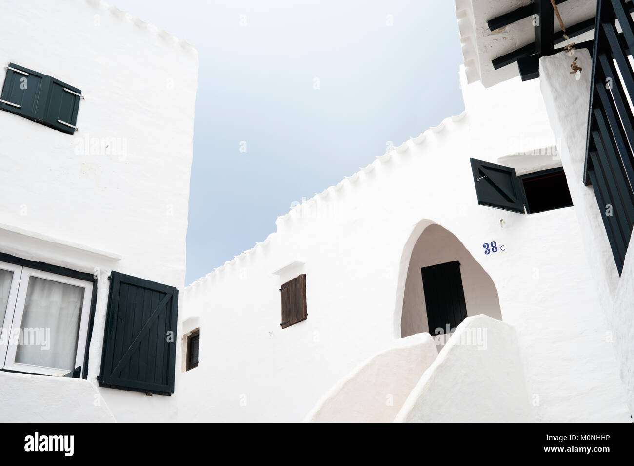 Windows in the white traditional small village Binibequer Vell located in Menorca, Balearic Islands, Spain. Stock Photo