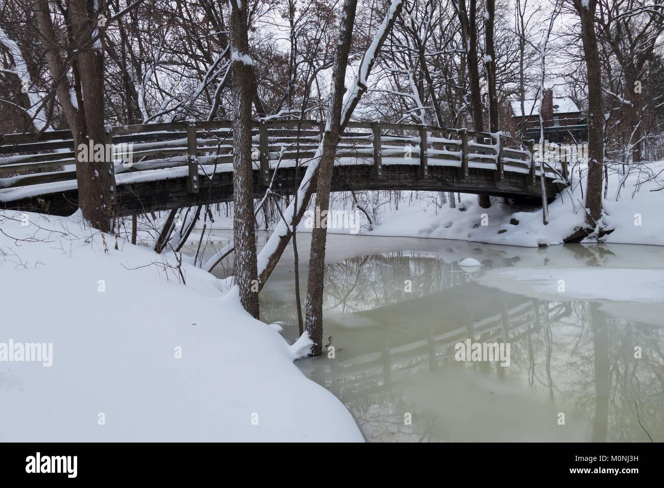 A foot bridge over Minnehaha Creek in Minneapolis, Minnesota, USA. Stock Photo