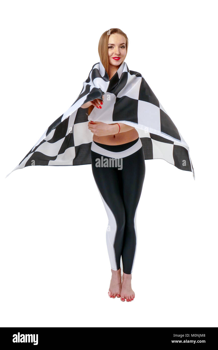 Woman is holding race checkerd flag.  Stock Photo