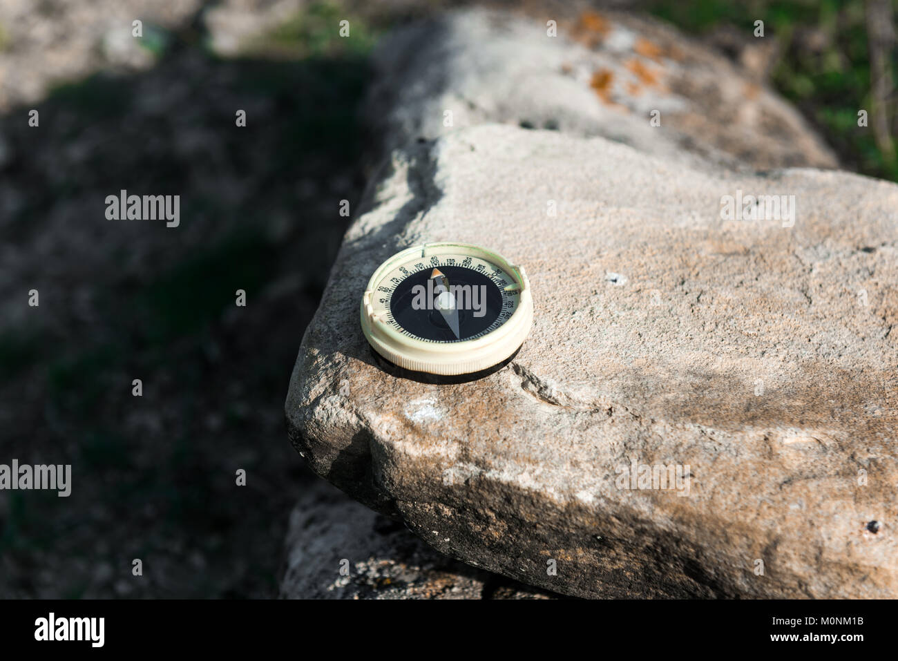 Vintage compass on the stone Stock Photo