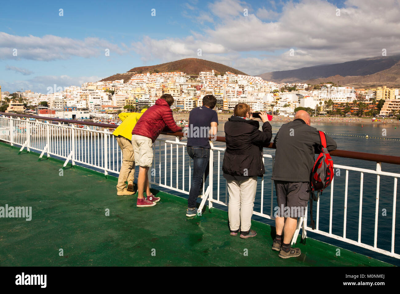 Passengers on a ferry coming into Los Christianos on Tenerife, Canary Islands. Stock Photo