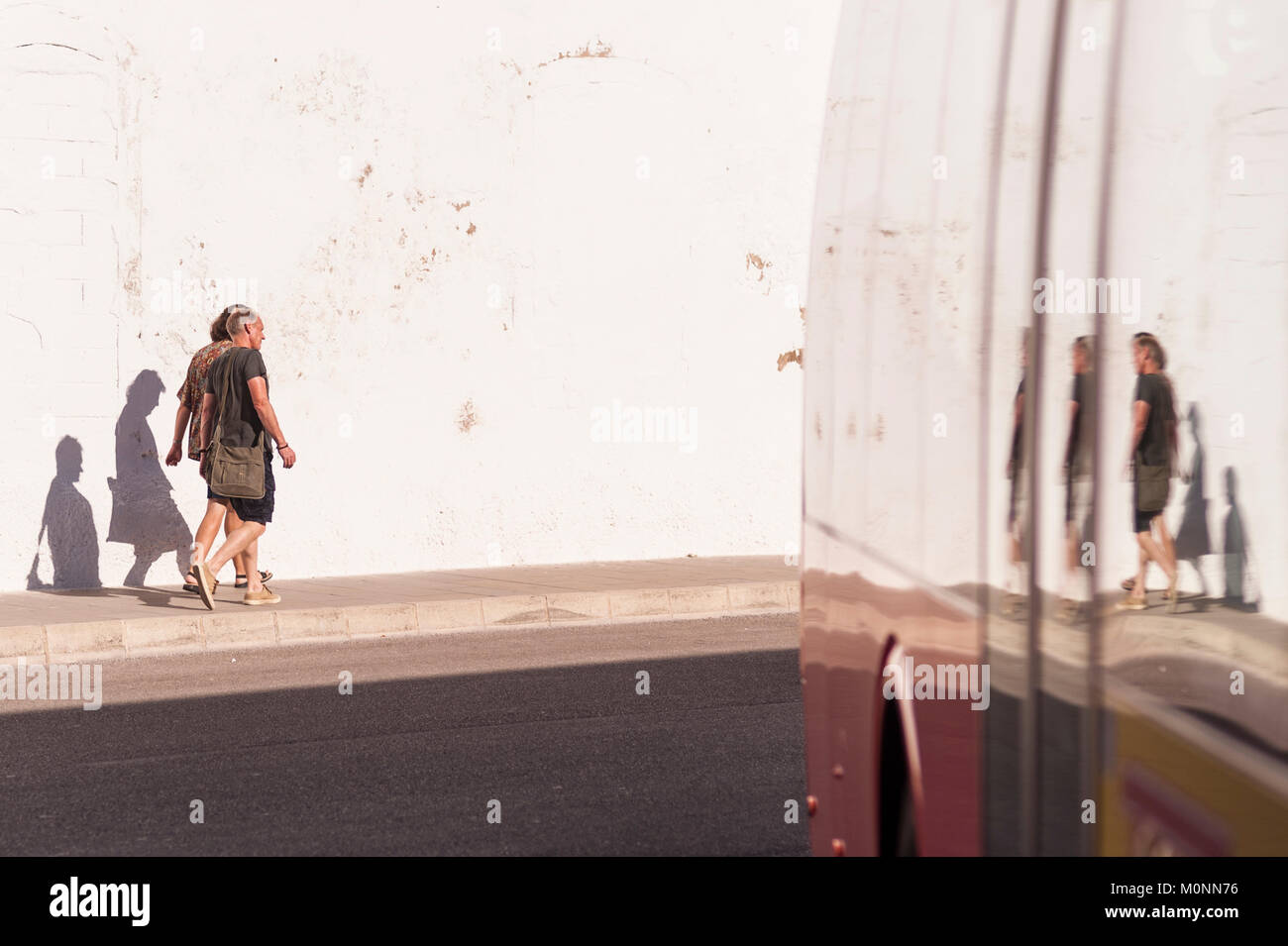 People walking near the bus station in Mahon , Menorca , Balearic Islands , Spain Stock Photo