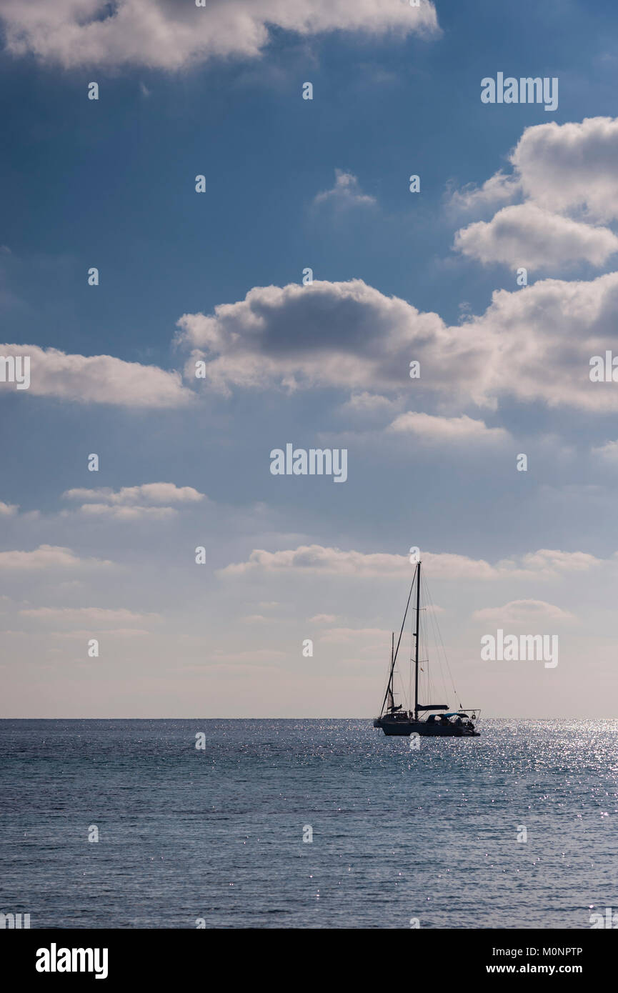 A sailing boat at Punta Prima , Menorca , Balearic Islands , Spain Stock Photo