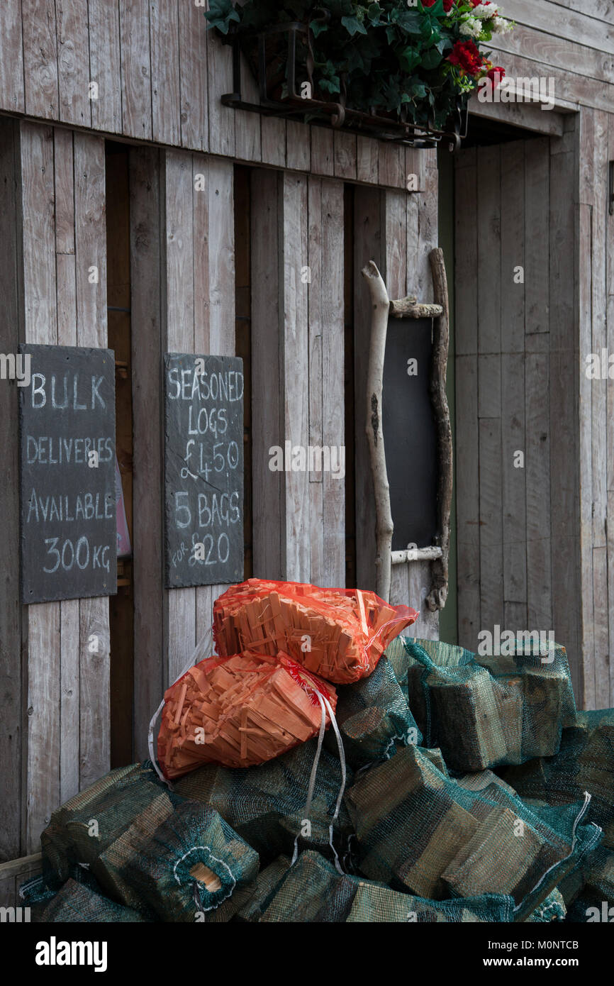 Showroom and store selling Wood Burning Stoves, Ranges, wood, sticks