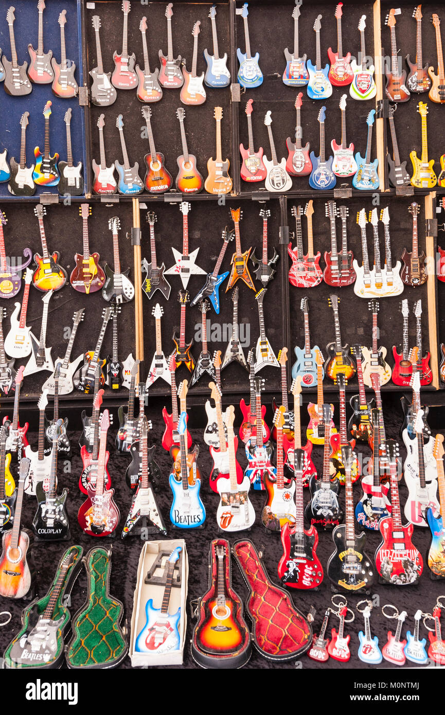 Mini souvenir guitars for sale at the street market in Mahon , Menorca , Balearic Islands , Spain Stock Photo