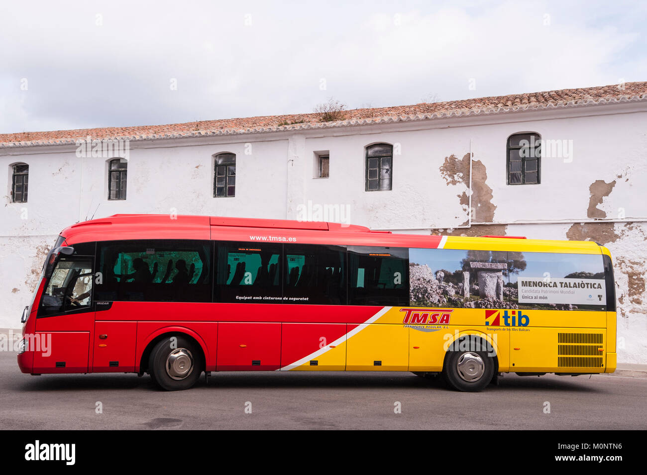 A public transport bus at the bus station in Mahon , Menorca , Balearic Islands , Spain Stock Photo