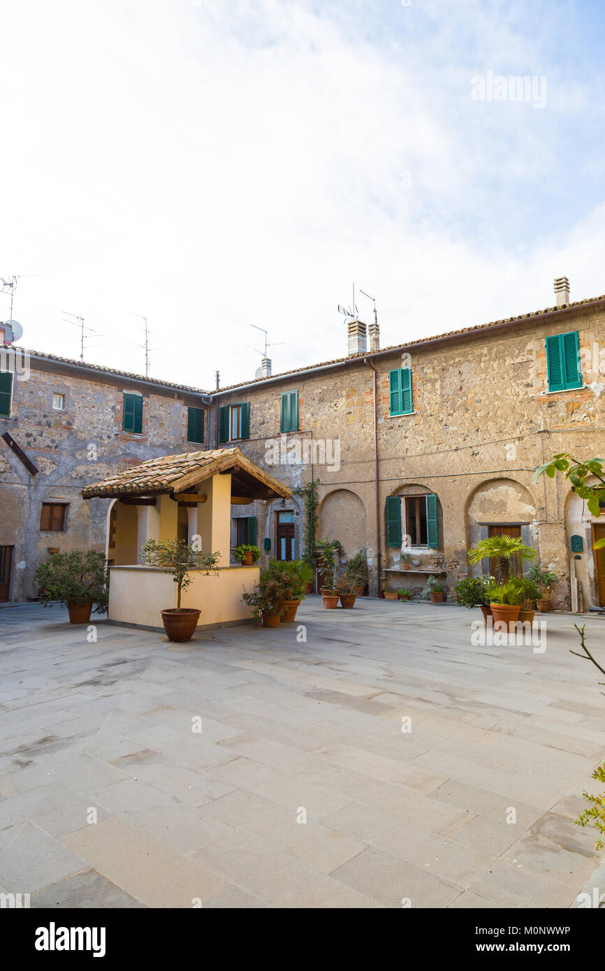 Courtyard inside an old building at San Lorenzo Nuovo, Viterbo, Italy. Stock Photo