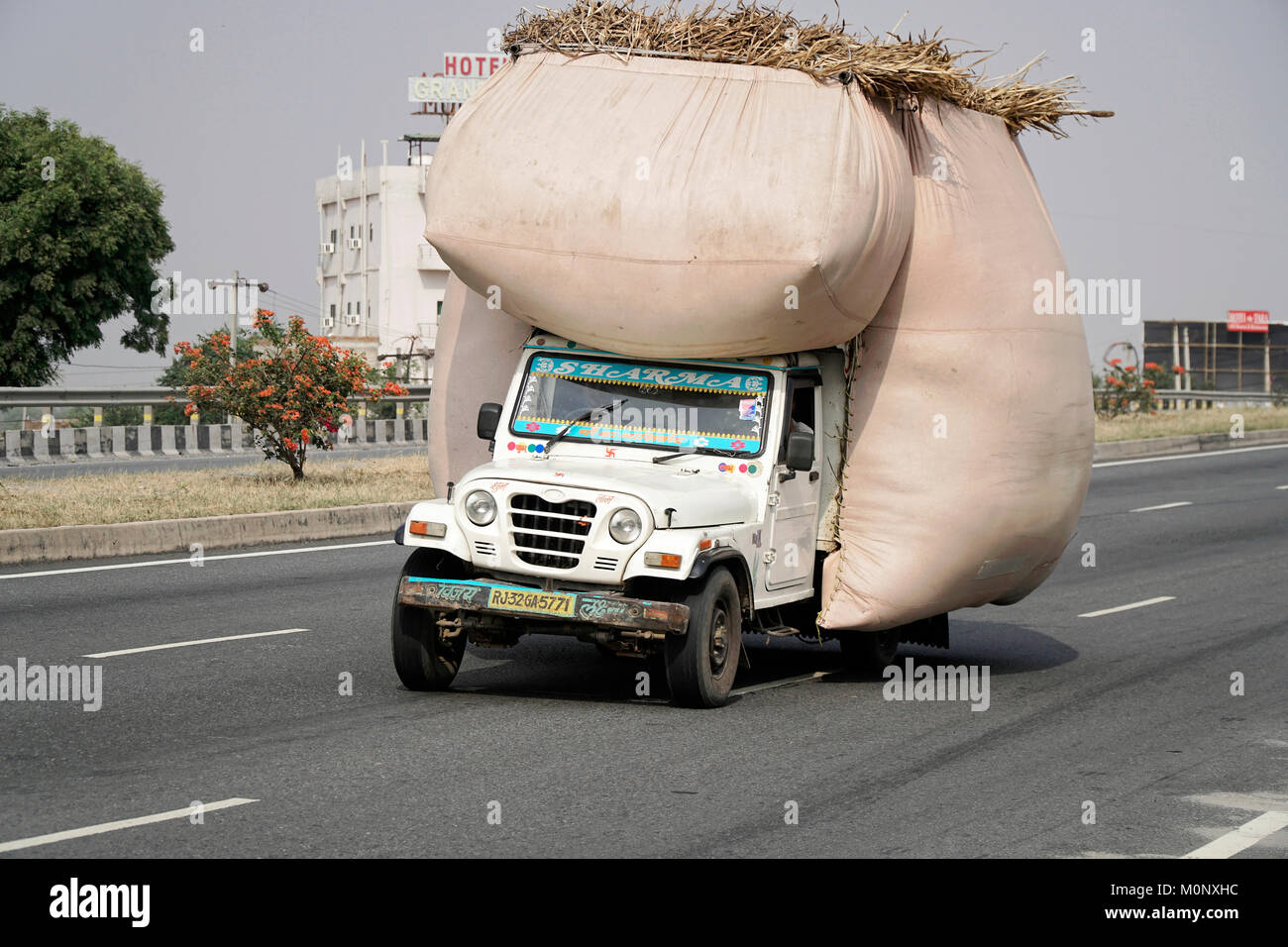 Fully loaded jeep,On the way near Jaipur,Rajasthan,India Stock Photo