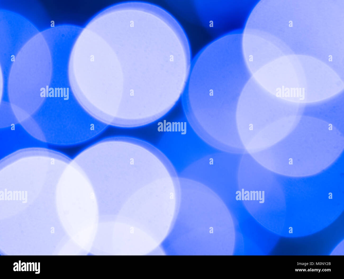 Blue and purple bokeh lights background, out of focus christmas lights Stock Photo