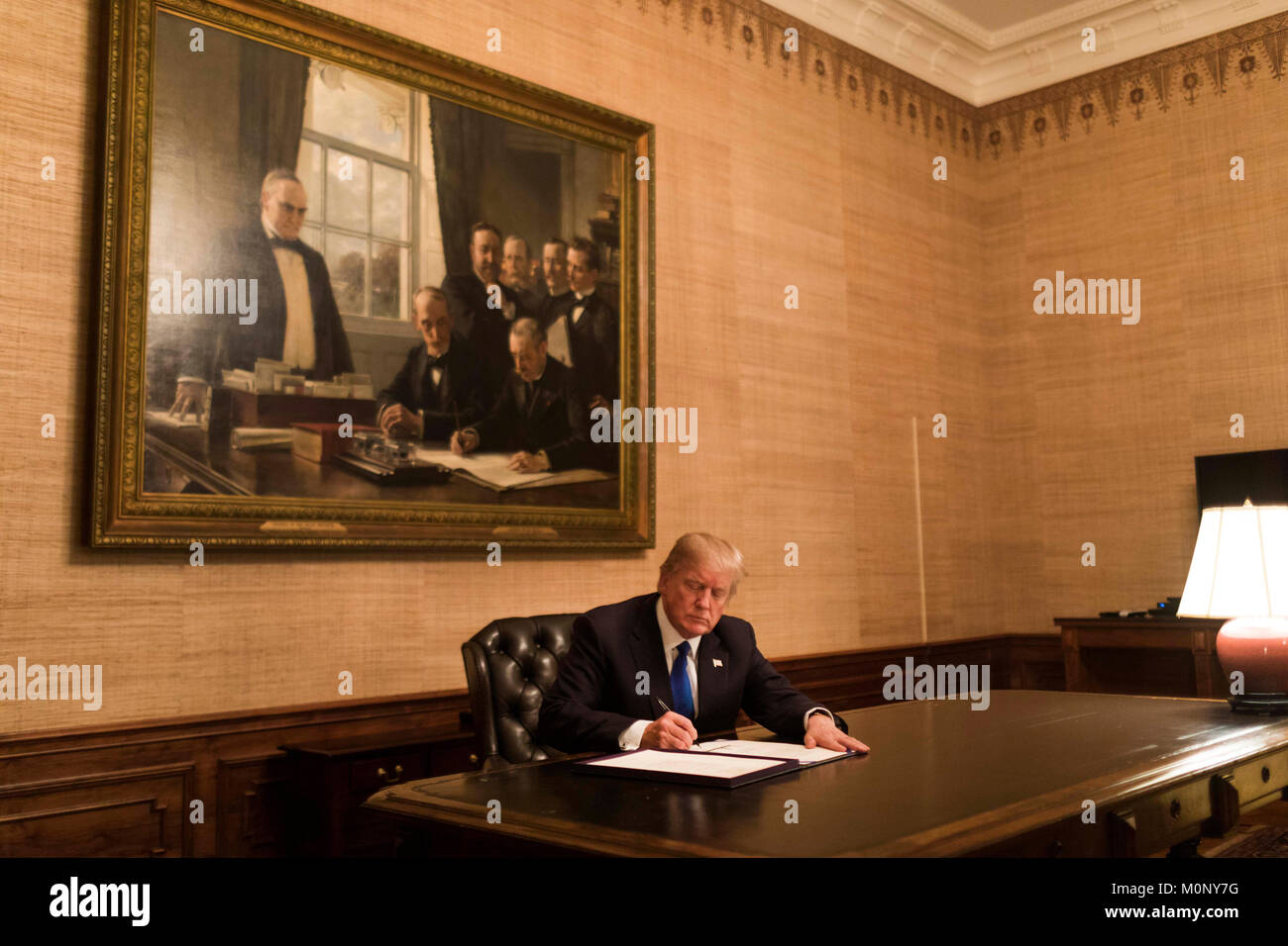 U.S. President Donald Trump signs the Extension of Continuing Appropriations Act January 22, 2018 in Washington, DC. The signing is a three week stopgap funding bill to re-open the federal government following the stalemate over immigration reform. Stock Photo