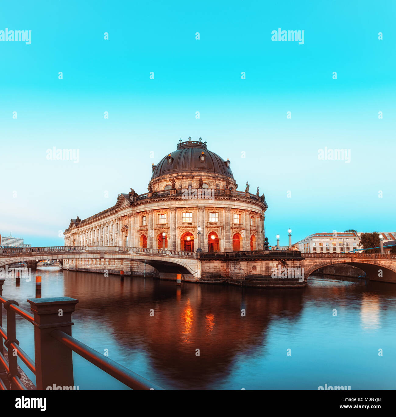 Night time illuminations of Museum Island in Berlin, Germany. Panorama image, that has been tinted. Stock Photo