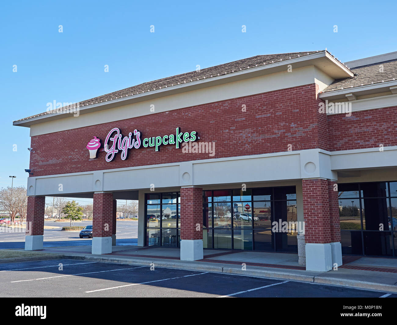 Exterior front of Gigi's Cupcakes retail storefront in a strip shopping mall in Montgomery Alabama, United States. Stock Photo