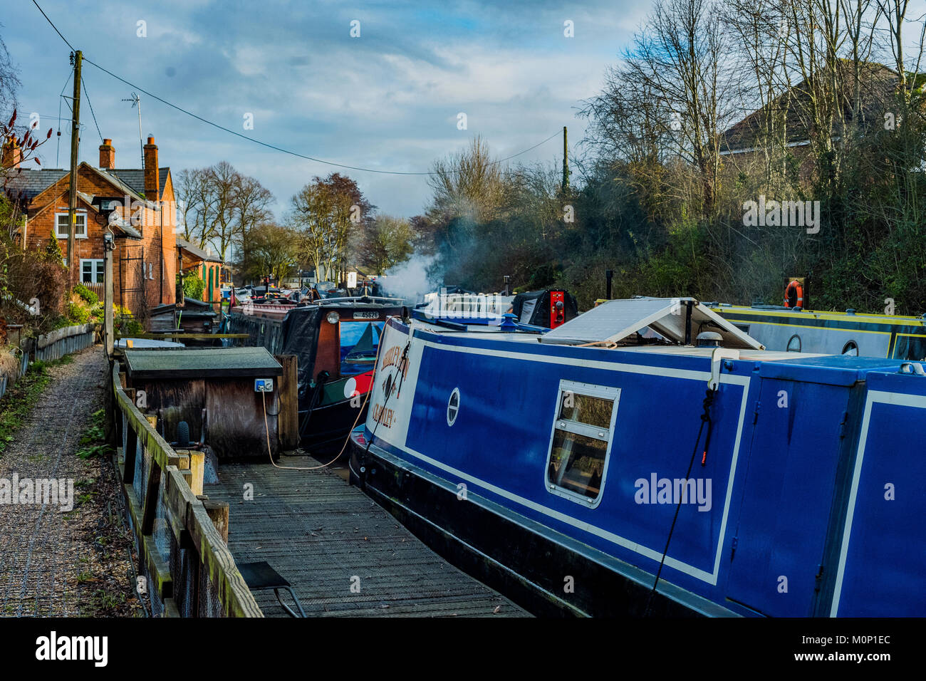 canal river in the english countryside bugbrooke, wharf, marina